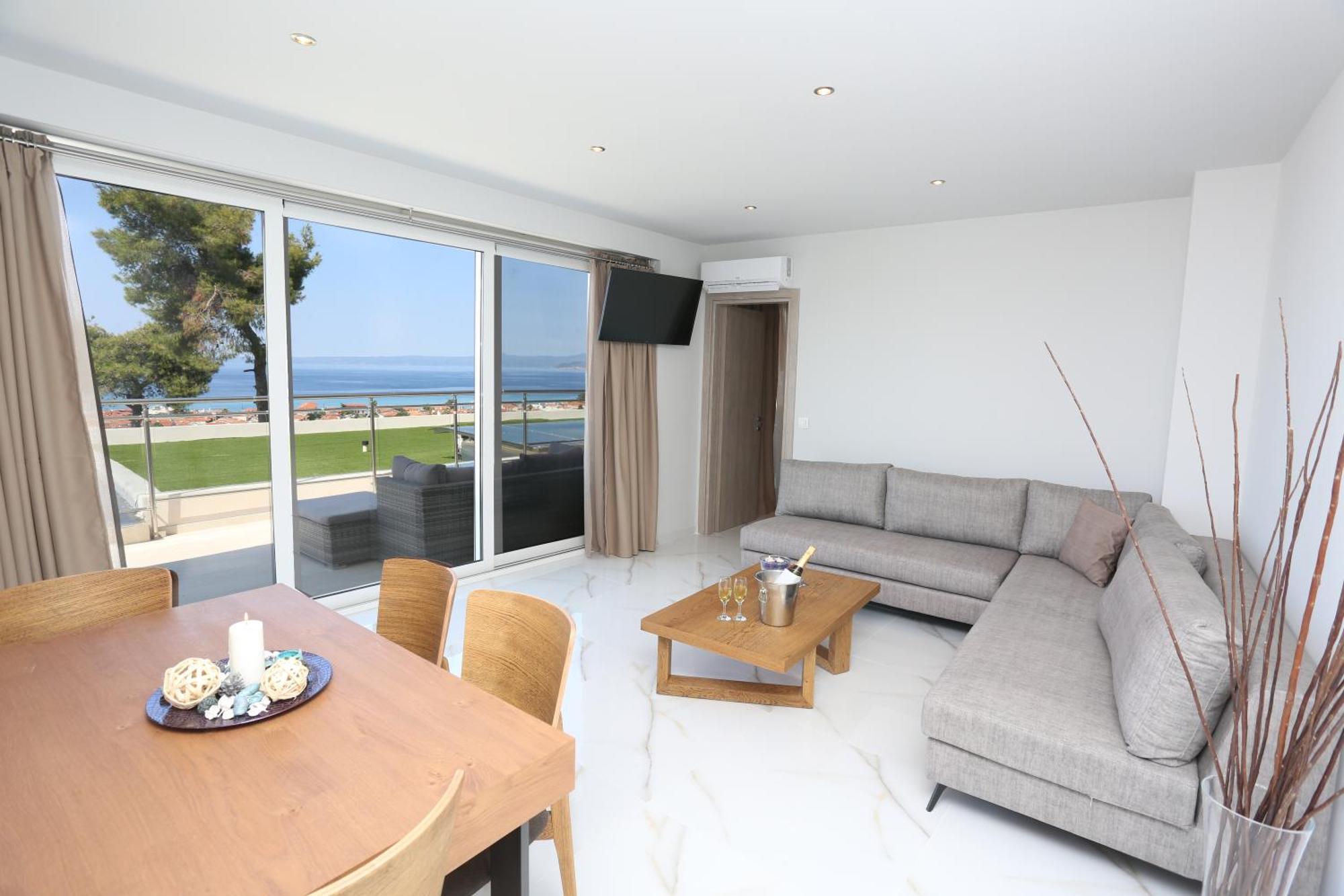 Alia Palace Hotel - Adults Only 16+ 哈爾基季基州 外观 照片 A living room